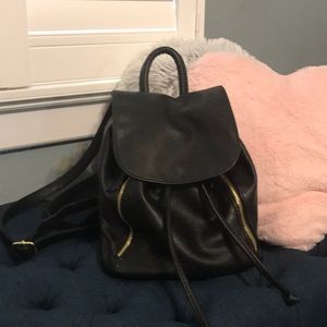 Black mini backpack.